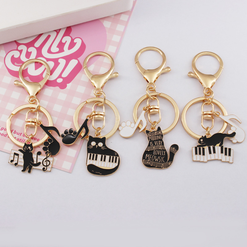 Alloy Piano Note Cat Keychain